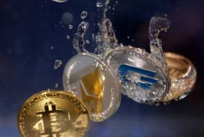 Illustration shows representation of cryptocurrency Bitcoin, Ethereum and Dash plunging into water