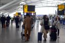  Passengers wait at Heathrow Terminal 5 airport