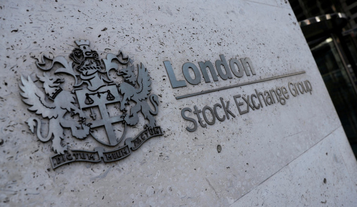 Signage is seen outside the entrance of the London Stock Exchange in London