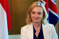 British trade minister Liz Truss speaks to Reuters after signing a free trade agreement with Singapore, in Singapore