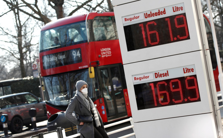 Increased petrol and diesel prices are seen at a filling station, in London