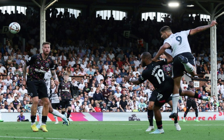 Aleksandar Mitrovic's (right) heads the winner that took Fulham up to fourth