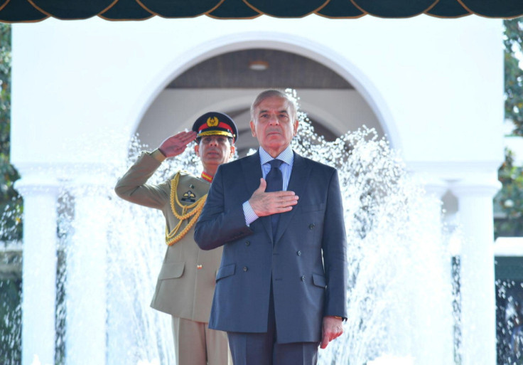 Pakistan's Prime Minister Shehbaz Sharif gestures during the guard of honour ceremony at the prime minister house in Islamabad