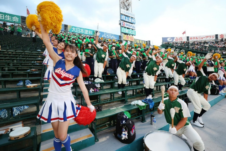 Cheerleaders, bands and classic uniforms at Koshien give a nod to baseball's US origins