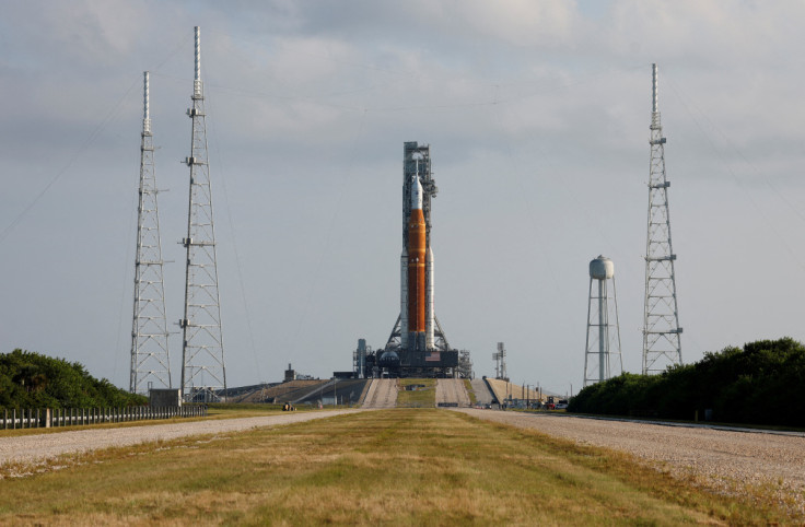 NASA's next-generation moon rocket, the SLS  Artemis 1 rocket with its Orion crew capsule perched on top, leaves the Vehicle Assembly Building