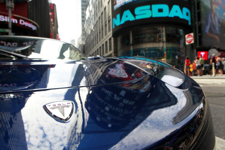 A Tesla Roadster is parked in New York's Times Square following Tesla Motors Inc's initial public offering at the NASDAQ market