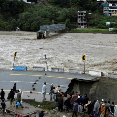 A bridge was washed away and the road destroyed in Swat by record monsoon rains in Pakistan