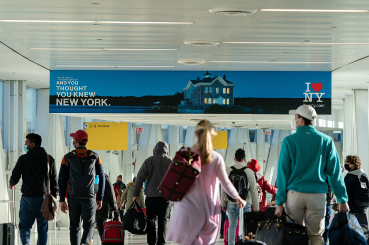 Passengers line up at John F. Kennedy International Airport in New York