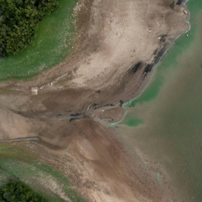An aerial picture shows low water levels in the Bough Beech Reservoir in Kent on August 23, 2022.