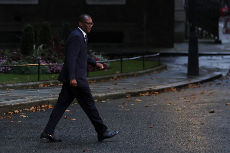 New Chancellor of the Exchequer Kwasi Kwarteng walks outside at Number 10 Downing Street in London