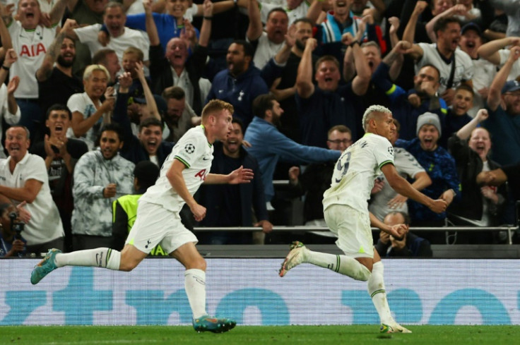 Richarlison (R) celebrates after scoring one of his two goals as Tottenham beat Marseille 2-0