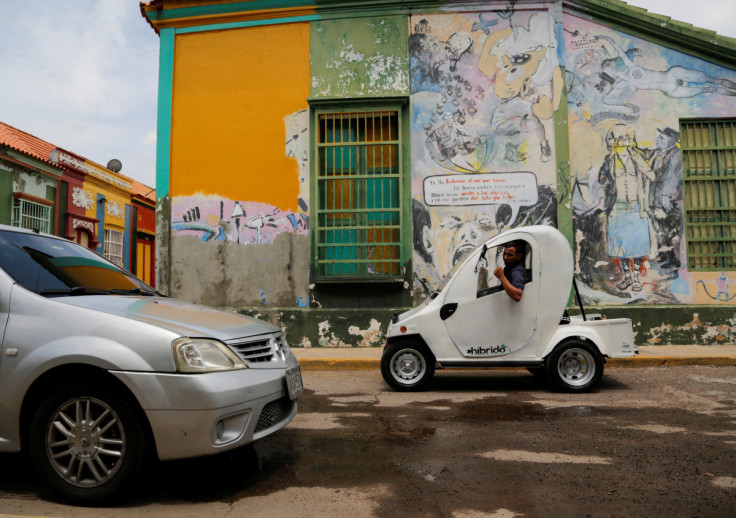 In Venezuelan oil town, solar-powered car offers escape from fuel lines