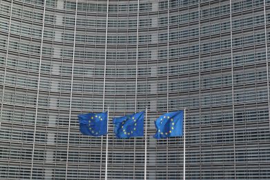 European Union flags fly outside the European Commission headquarters in Brussels