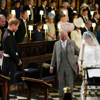Charles walked Harry's fiancee Meghan Markle down the aisle in 2018