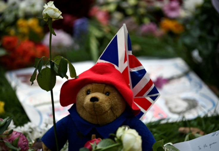 Paddington Bear toys and tributes are among the thousands of flowers left for Queen Elizabeth II near Buckingham Palace