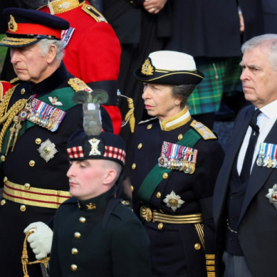 There were several arrests in Edinburgh, after Prince Andrew (R) was heckled during a procession behind his mother's coffin
