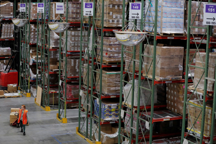 Amazon workers perform their jobs inside of an Amazon fulfillment center on Cyber Monday in Robbinsville, New Jersey