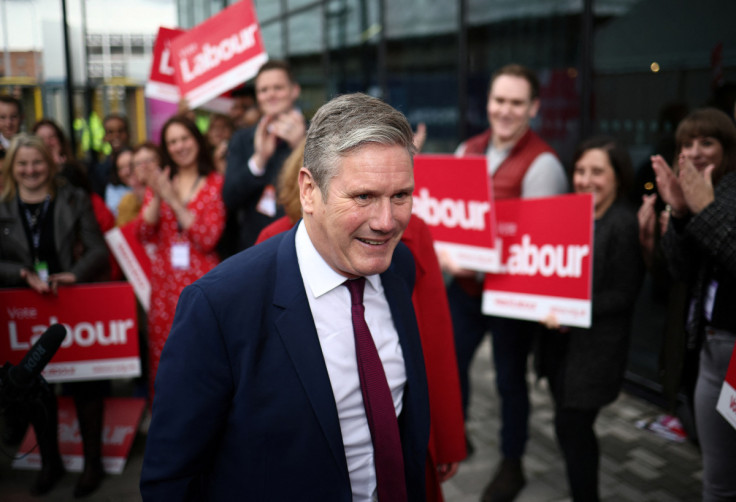 British leader of the Labour Party Kier Starmer arrives at a hotel ahead of the Labour Party Conference in Liverpool