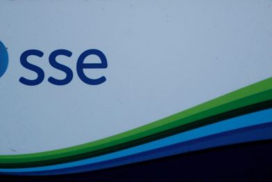 An SSE company logo is seen on signage outside the Pitlochry Dam hydro electric power station in Pitlochry