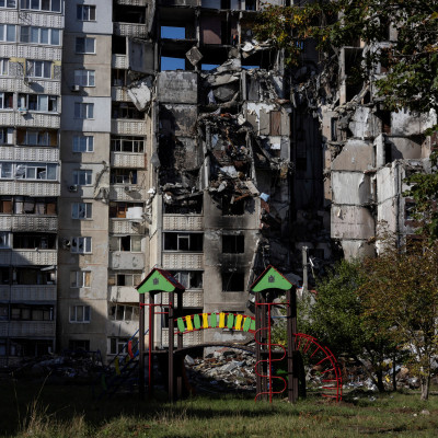 A destroyed building is seen in Saltivka neighbourhood of Kharkiv