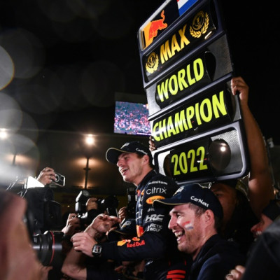 Max Verstappen celebrates winning the world championship in Japan with his Red Bull teammates