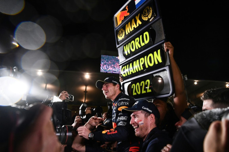 Max Verstappen celebrates winning the world championship in Japan with his Red Bull teammates