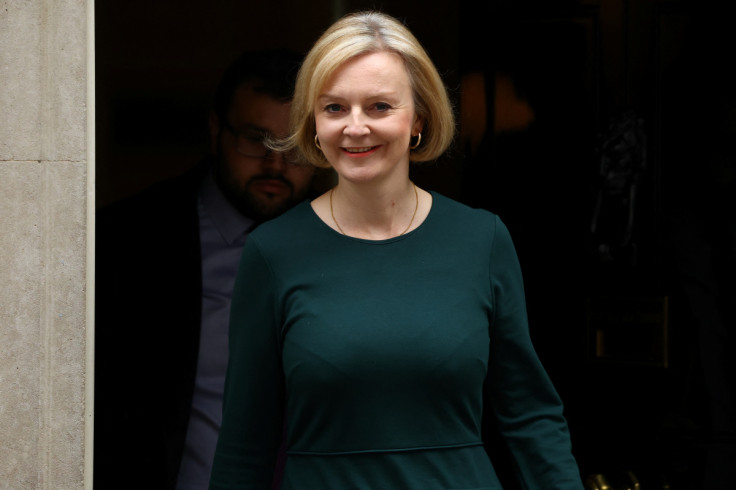 British Prime Minister Liz Truss walks outside Number 10 Downing Street, in London