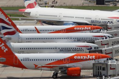 British Airways and Easyjet aircraft are parked at the South Terminal at Gatwick Airport, in Crawley