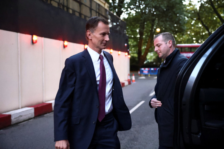 British Chancellor of the Exchequer Jeremy Hunt leaves a tv studio, in London