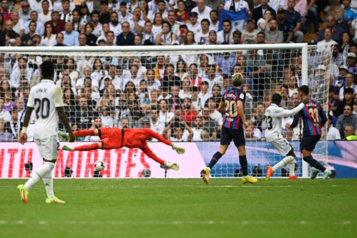 Barcelona's Spanish forward Ferran Torres (R) pulled one goal back for his team