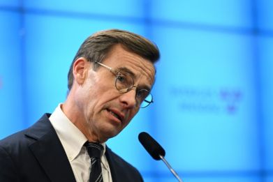 Ulf Kristersson was elected premier by the Swedish parliament with a wafer-thin majority of three votes