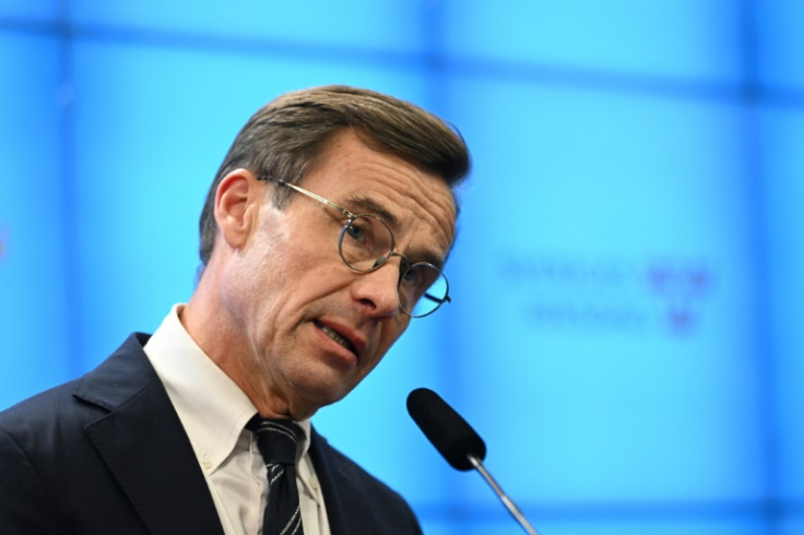 Ulf Kristersson was elected premier by the Swedish parliament with a wafer-thin majority of three votes