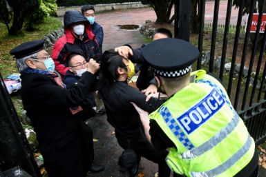 British police have said a group of men came out of China's Manchester consulate and dragged one of the protesters inside