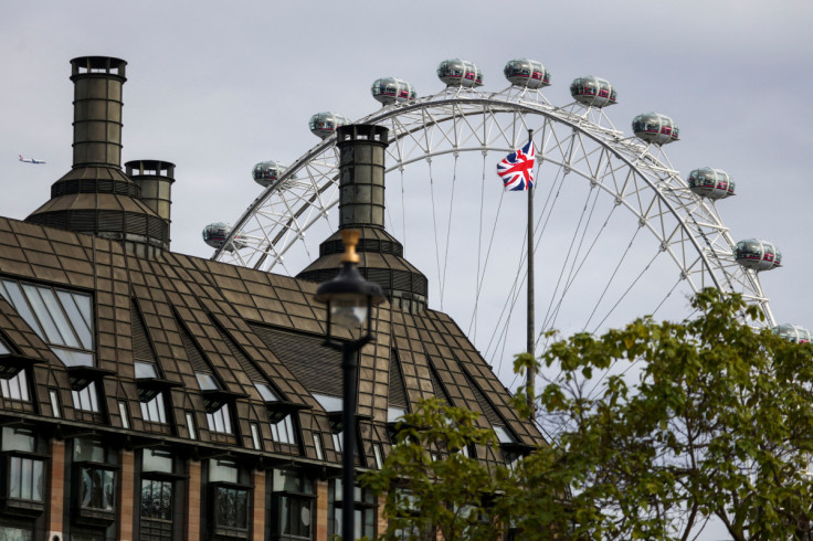 A Union Jack flag flutters at full mast following the end of the official period of mourning of Britain's Queen Elizabeth, in London
