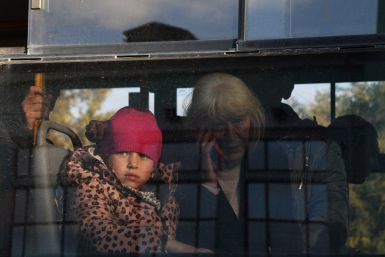 FILE PHOTO - Civilians evacuated from the Russian-controlled Kherson region of Ukraine arrive in Dzhankoi