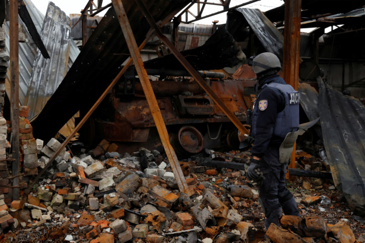 FILE PHOTO - De-mining squad sclear rocket shells and other explosive devices from an area close to the Russian border, in Kazacha Lopan