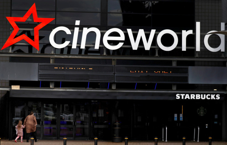 People enter a Cineworld cinema following the outbreak of the coronavirus disease (COVID-19) near Manchester