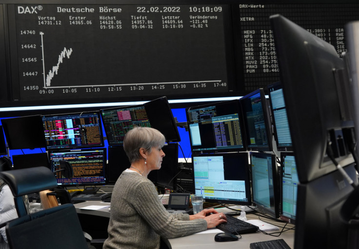 A trader works at the Frankfurt stock exchange in Frankfurt