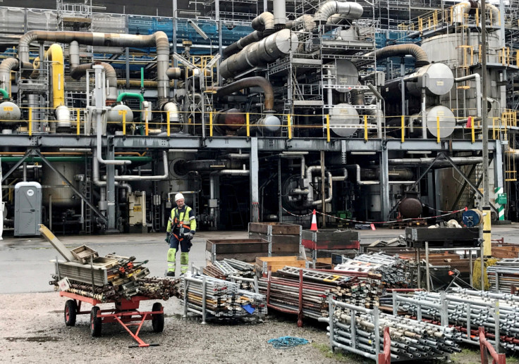 A worker walks at the Yara ammonia plant in Porsgrunn