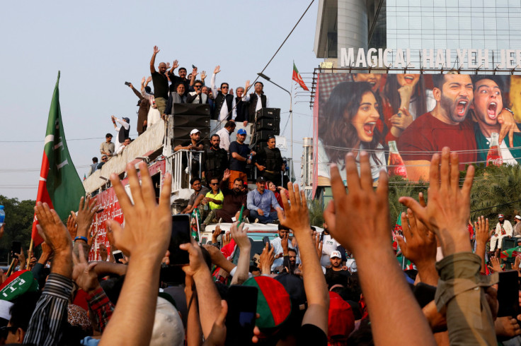 Pakistan's former prime minister Imran Khan leads a freedom march to pressure the government to announce new elections, in Lahore