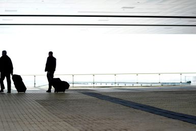 Business travellers enter the airport hotel at Denver International Airport in Denver