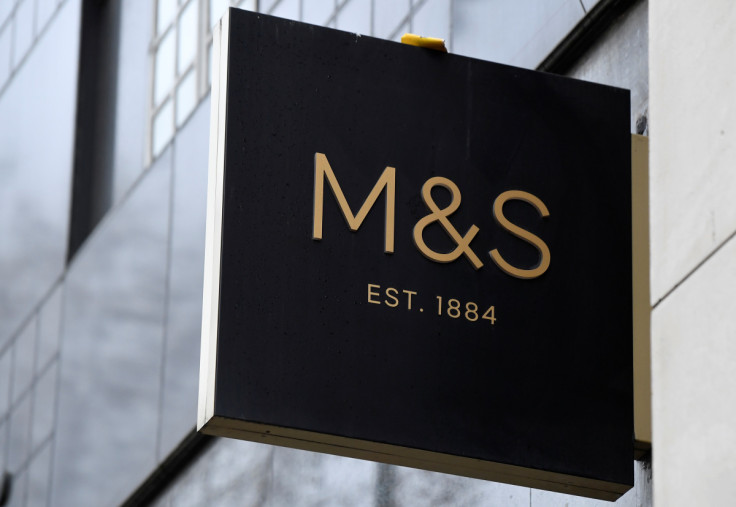 A sign for Marks and Spencer (M&S) hangs outside one of their UK stores in London
