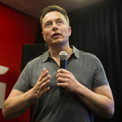 Tesla CEO Elon Musk speaks about new Autopilot features during a Tesla event in Palo Alto