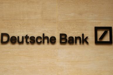 The logo of Deutsche Bank is pictured on a company's office in London