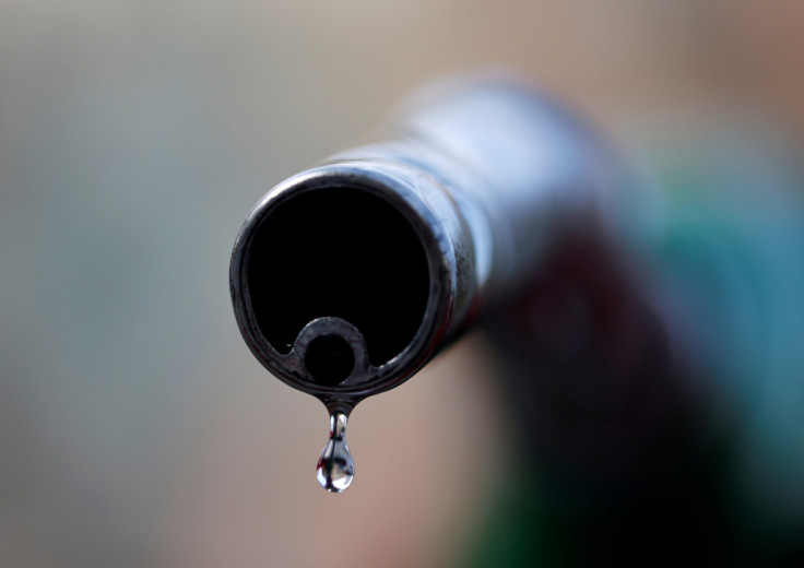 A drop of diesel is seen at the tip of a nozzle in a petrol station in Nice