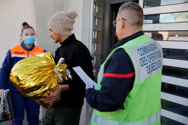 Migrants leave Sangatte community centre northern France