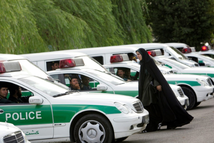 The morality police squads were usually made up of men in green uniforms and women clad in black chadors