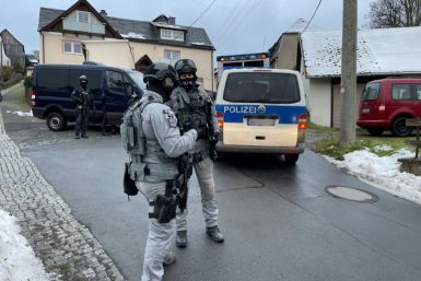 German police staged nationwide raids and arrested 25 people suspected of belonging to a far-right "terror cell" plotting to overthrow the government and attack parliament