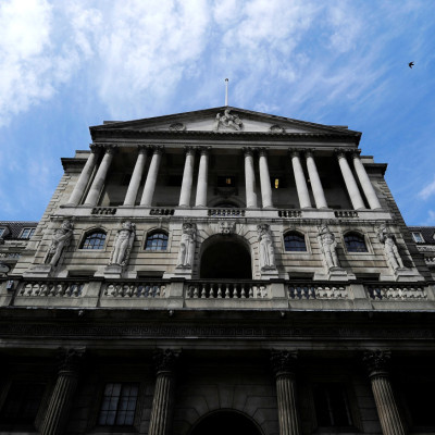 The Bank of England is seen against a blue sky, London