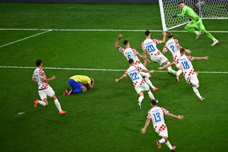 Croatia players celebrate their win on penalties against Brazil in the World Cup quarter-finals